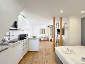 Fridge, microwave, coffee/tea maker, toaster