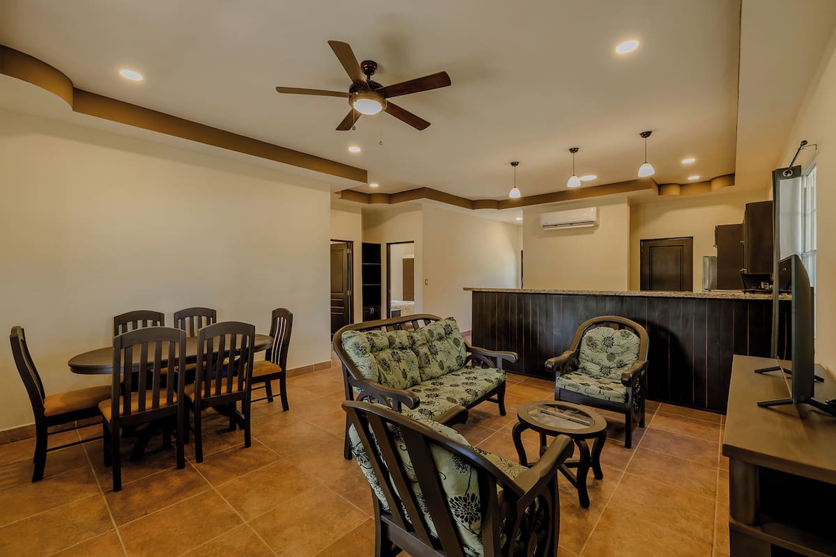 Deluxe House, 2 Bedrooms, Patio, Garden View | Living room | 40-inch Smart TV with cable channels