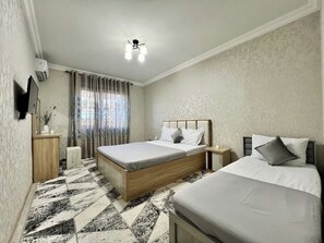 Blackout drapes, iron/ironing board, free WiFi