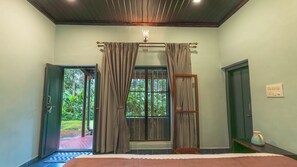 Deluxe Double Room, Air conditioning, Garden View | Iron/ironing board - Chandramukuta Resort by Z Vacations (Chikkamagaluru)