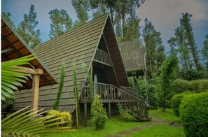 Exclusive Studio, Air conditioning, Resort View | Iron/ironing board, bed sheets