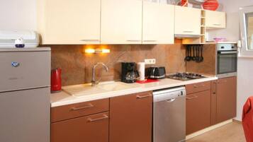 Apartment (Two Bedroom Apartment with Balcony) | Private kitchen | Fridge