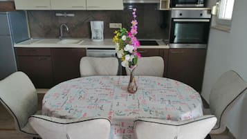 Apartment (Two Bedroom Apartment with Balcony) | Private kitchen | Fridge