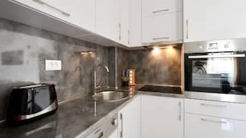 Apartment (Three Bedroom Apartment with Balcony) | Private kitchen | Fridge