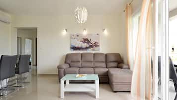 Apartment (Three Bedroom Apartment with Balcony) | Living room | 32-inch flat-screen TV with satellite channels