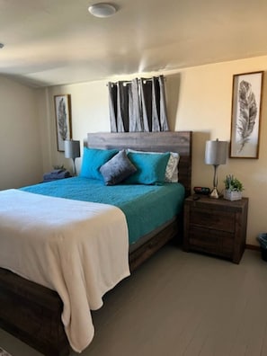 1 bedroom, desk, iron/ironing board, travel crib