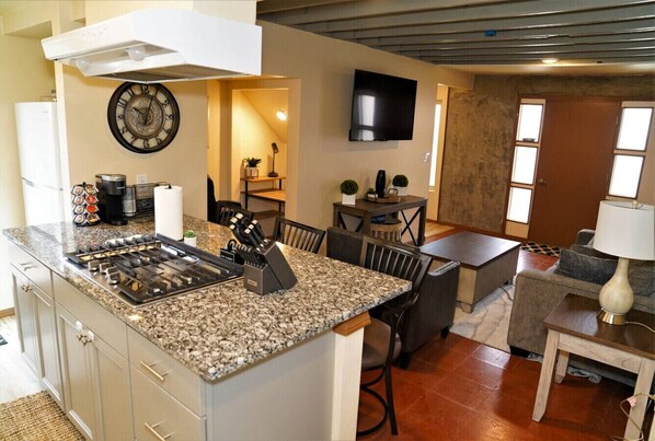 Fridge, microwave, stovetop, coffee/tea maker