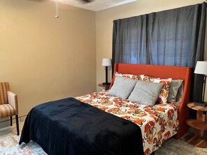 1 bedroom, desk, iron/ironing board, travel crib