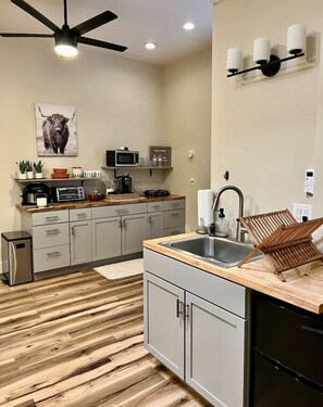 Microwave, coffee/tea maker, toaster, cookware/dishes/utensils