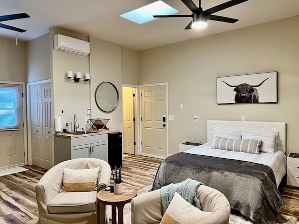 1 bedroom, desk, iron/ironing board, travel crib