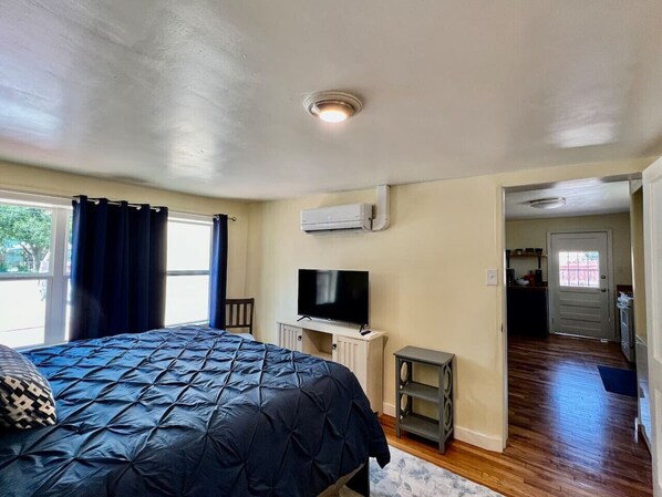 1 bedroom, desk, iron/ironing board, travel crib