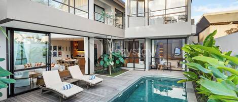 Outdoor pool, sun loungers