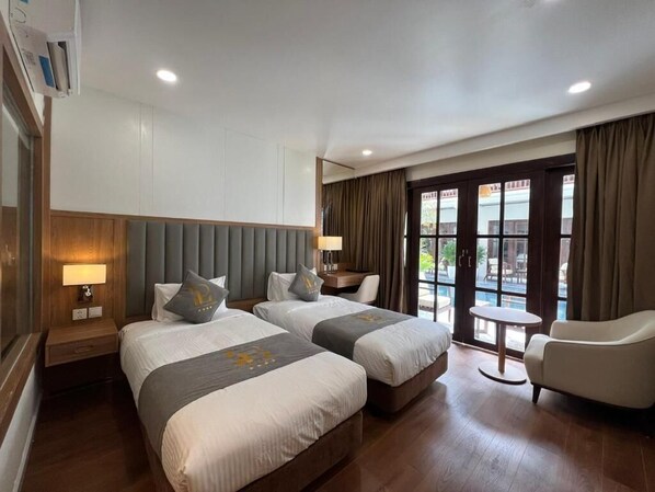 Deluxe Twin Room, Balcony, Garden View | In-room safe, soundproofing, free WiFi