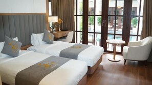 Deluxe Twin Room, Balcony, Garden View | In-room safe, soundproofing, free WiFi