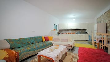 Apartment, Balcony, Courtyard View | Living area | Flat-screen TV