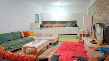 Apartment, Balcony, Courtyard View | Living area | Flat-screen TV