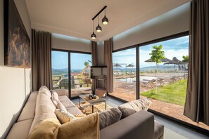 Deluxe Apartment, Balcony, Courtyard View | Living area | Flat-screen TV - Dreamy Farm (Mesopotam)