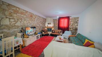 Apartment, Balcony, Courtyard View | Living area | Flat-screen TV