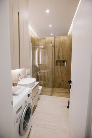 Hair dryer, bidet, towels, soap
