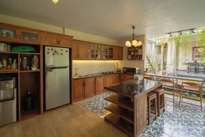Fridge, microwave, stovetop, cookware/dishes/utensils
