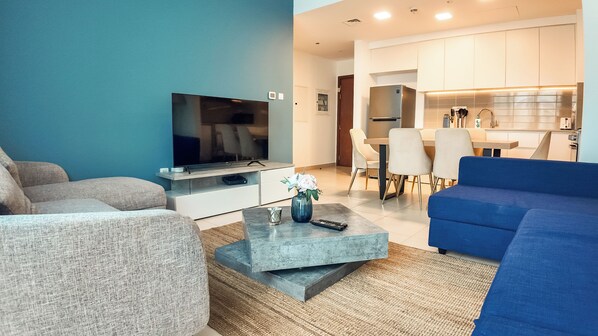 Apartamento, vista para a piscina | Área de estar