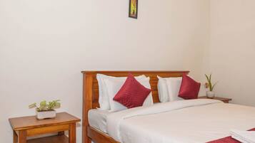 Executive Double Room, Garden View | Desk, iron/ironing board, bed sheets