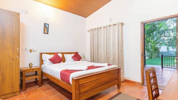 Comfort Double Room, Garden View | Desk, iron/ironing board, bed sheets