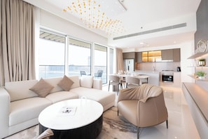 Deluxe Apartment, Balcony, Sea View | Living area | Smart TV, Netflix, streaming services