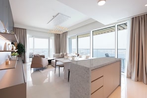 Deluxe Apartment, Balcony, Sea View | Private kitchen | Fridge, microwave, oven, stovetop