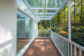 Deluxe Room, Garden View | Terrace/patio