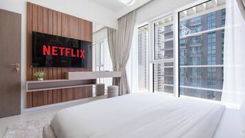 Departamento Deluxe, balcón, vista al mar | Ropa de cama de alta calidad y camas con efecto memoria