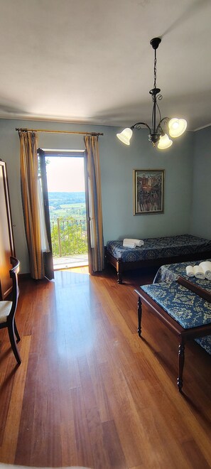 Superior Triple Room, Balcony, Hill View | Blackout drapes, free WiFi