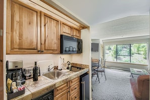 Microwave, stovetop, dishwasher, coffee/tea maker