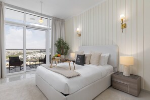 Deluxe Studio, Non Smoking | In-room safe, blackout drapes, iron/ironing board, free WiFi