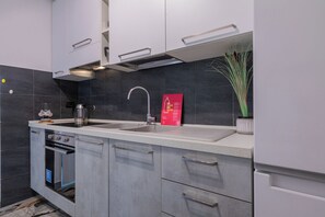 Apartment, 1 Bedroom | Private kitchen | Fridge, oven, stovetop, electric kettle