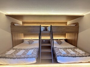 Family Condo | In-room safe, individually decorated, desk, blackout drapes
