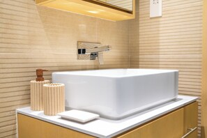 Superior Apartment, Balcony | Bathroom | Slippers - Cozy Chic 2BR - Pool Gym Access - JVC (Dubai)