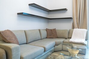 Superior Apartment, Balcony | Living area | Toys