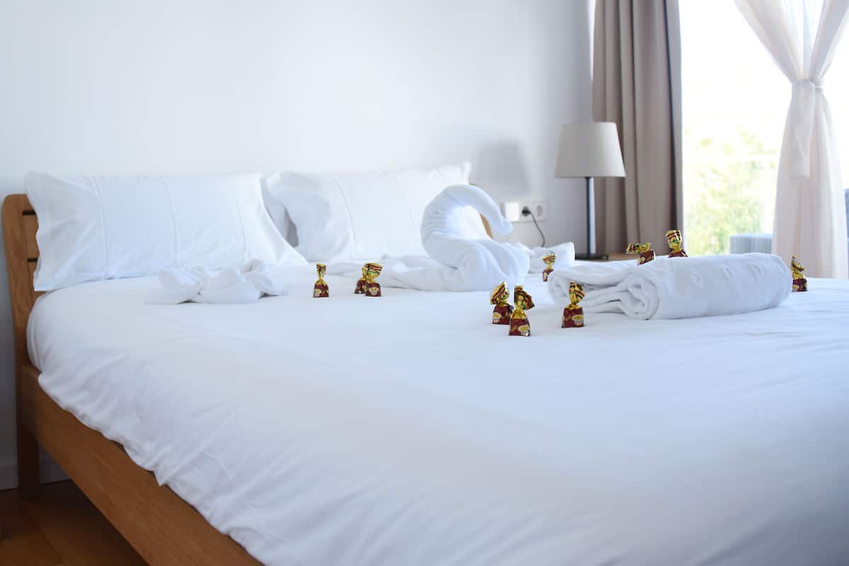 Deluxe villa | Luxe beddengoed, donsdekens, een kluis op de kamer