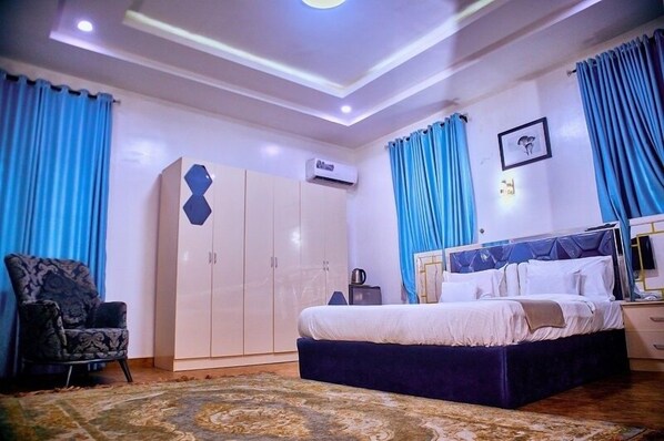 Economy Apartment, Balcony, City View | In-room safe, desk, laptop workspace, blackout curtains