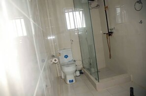 Economy Apartment, Balcony, City View | Bathroom | Free toiletries, hair dryer, towels, soap