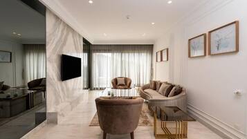 Studio, Balcony, Golf View | Living area | Flat-screen TV