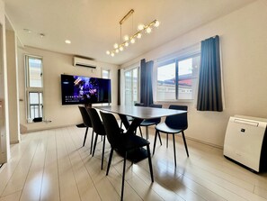 Luxury Villa, Balcony, City View | Living area | 75-inch LED TV with cable channels - COREHOTEL Ikebukuro (Tokyo)