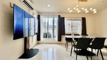 Luxury Villa, Balcony, City View | Living area | 75-inch LED TV with cable channels