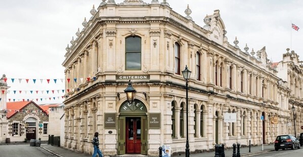 A historic building with a prominent "CRITERION HOTEL" sign, a traditional facade, and a "BAR EATERY" sign. - Criterion Boutique Hotel (Oamaru)