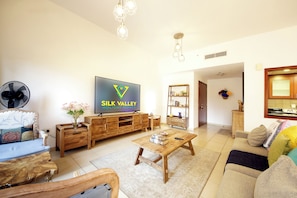 Apartamento superluxo, vista para a cidade | Área de estar