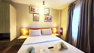 Habitación estándar | Escritorio, camas extra, wifi gratis y ropa de cama