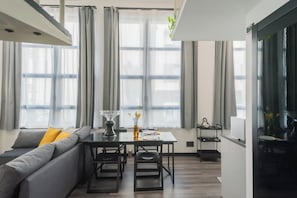 Apartment (1 Bedroom) | Living area | 32-inch TV with cable channels