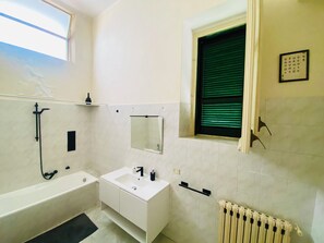 Hair dryer, bidet, towels, soap