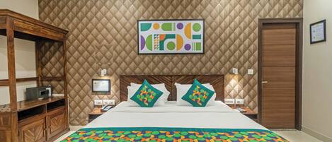 Habitación doble Deluxe | Tabla de planchar con plancha